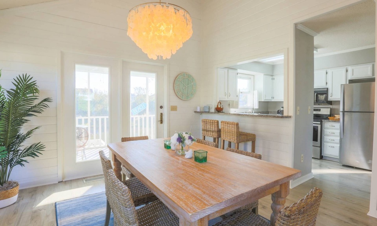 Pelican Bay House | Beach Home with Lagoon Views, Screened Porch, Deck & Community Pool. Only 5 Minute Walk to Beach!