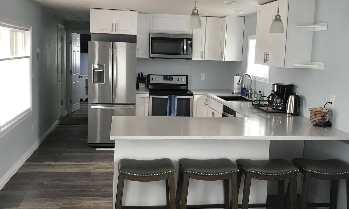 North Douglas House | Beachfront community with city and mountain view.