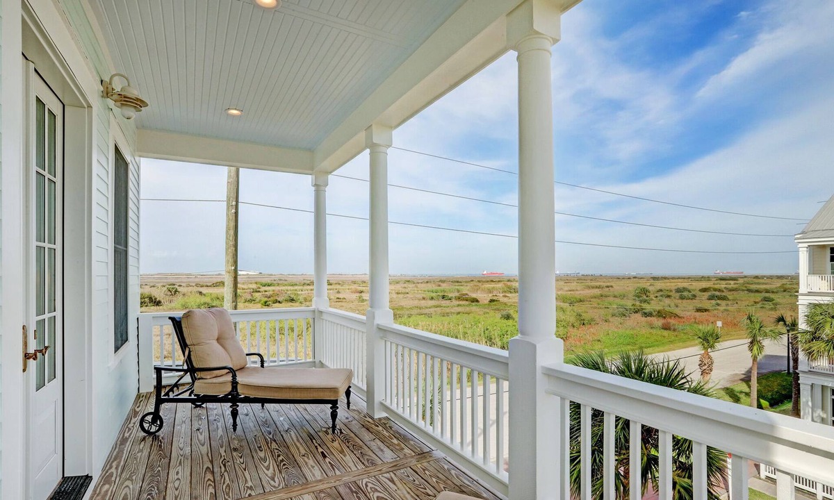 Beachtown House | Beachtown Galveston - Pet Friendly - Views from Wrap-Around Porch + Elevator