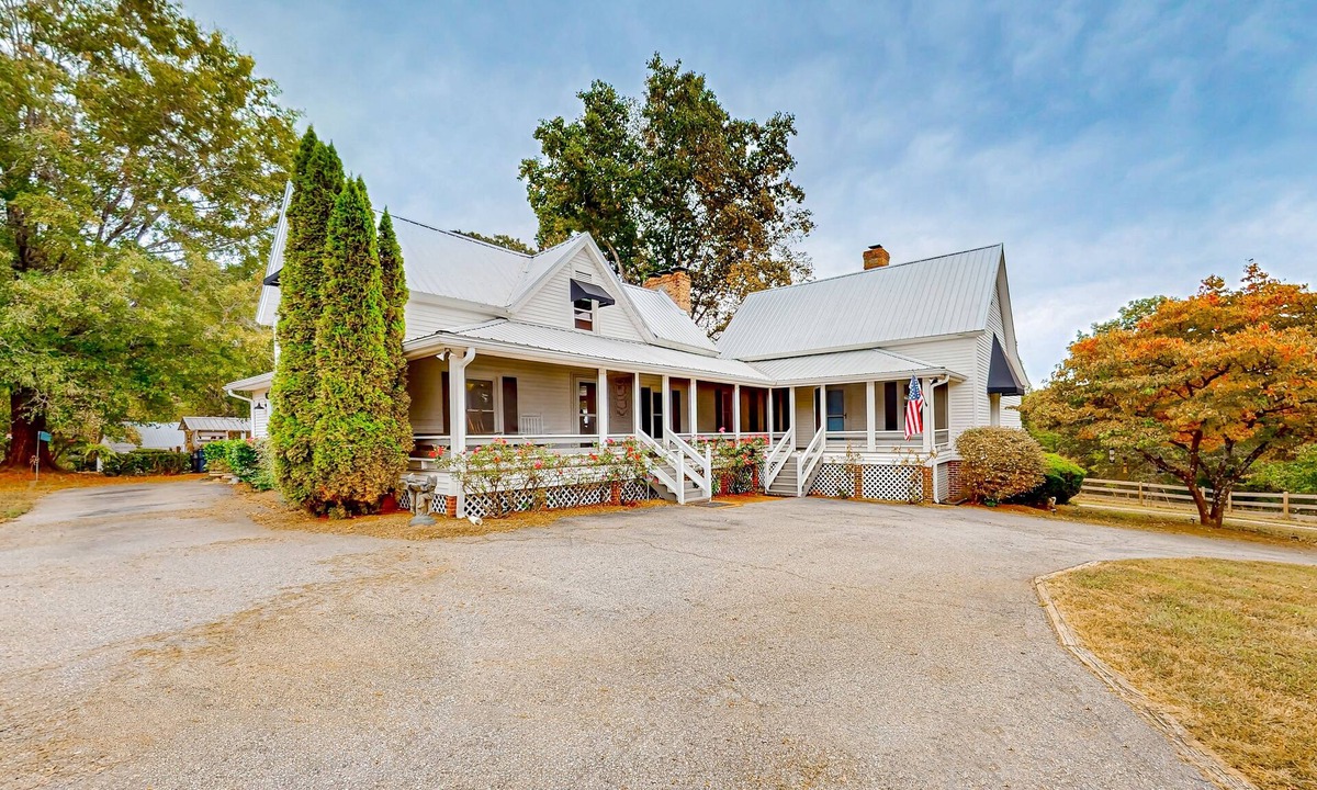 Landrum House | Dog-friendly farmhouse with hot tub, outdoor areas, & 3 fireplaces
