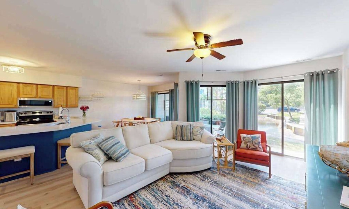 Fenwick Island Condo | East of Sun condo with water-view patio, on-site pool & tennis - near beach