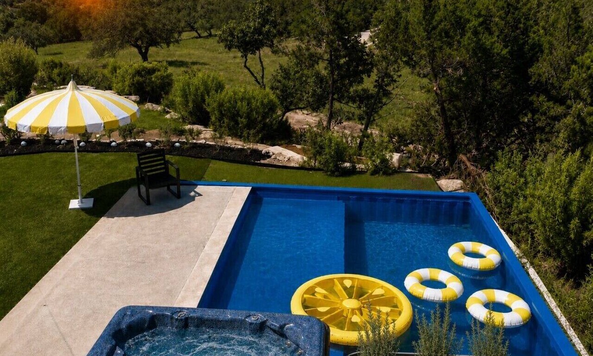 Spring Branch House | Farmhouse- Pool, Hot tub, Putting green, Swimming hole
