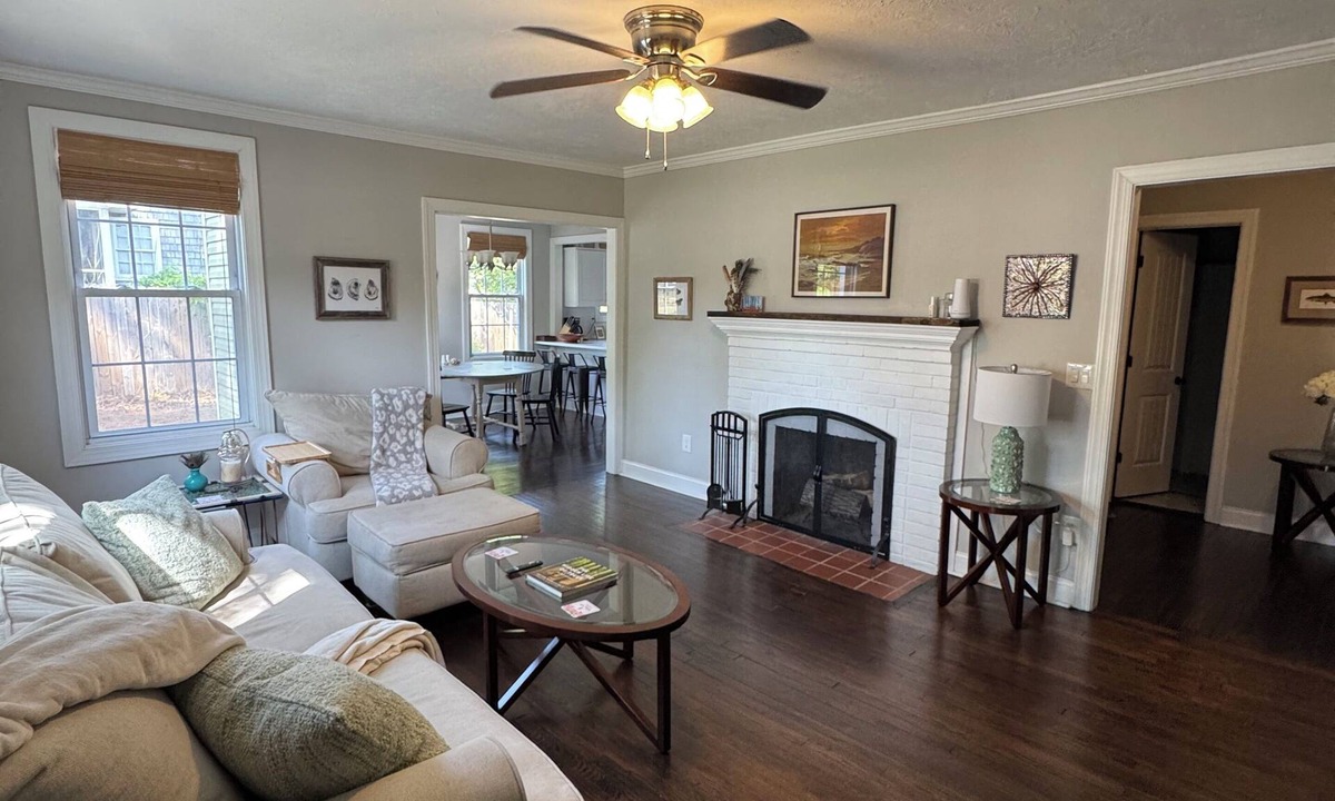 Pendleton King House | Masters rental with spacious back porch, fenced in yard, and park frontage.