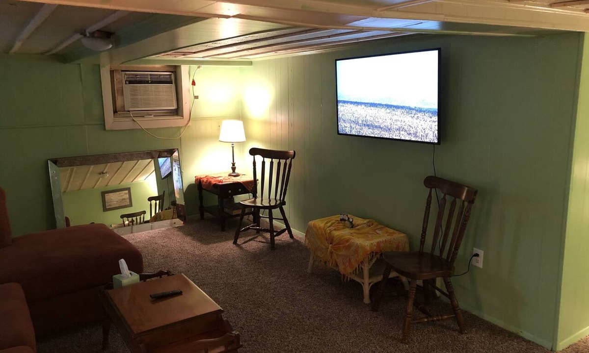 Cottage Line Apartment | Rustic BEACH FRONT Basement Apt, Pet Friendly Wi-Fi by RedAwning