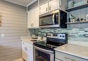 Stunning Newly Renovated Condo w/Ocean View & Shared Pool - Close to the Beach