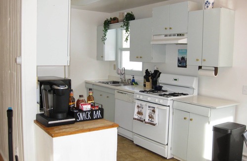 Sand Lake House | 10 minutes from the airport. Lots of amenities! Private acre.