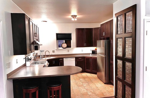 Rabbit Creek House | 2 Bedrooms, Sleeps 6-8 with private deck, gym and game room. Near the trails.