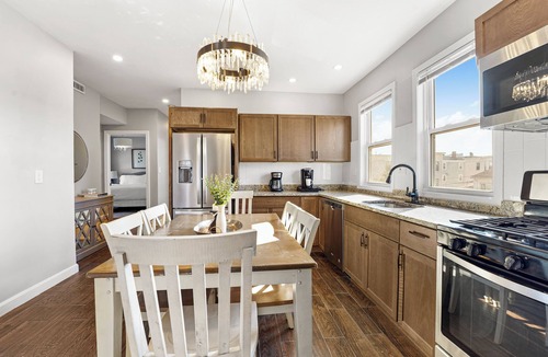 Meeting House Hill Condo | 4BR Near Downtown Boston Private Driveway Parking & 1-Min Walk to Train
