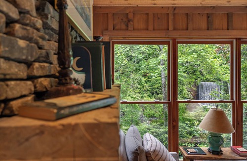 Mirror Lake Cabin | A 100-Year-Old Mill. A River That Wraps the House. A Water Wheel Still Turning | The Millhouse