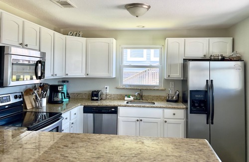 Jamaica Beach House | At Coastal Casa enjoy the waves, the breeze, and a quick walk to the sand.
