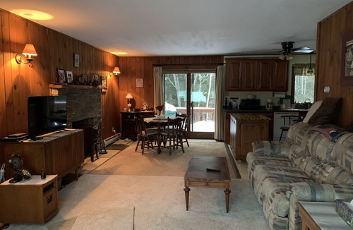 Newport Cabin | Cabin is nestled near the Sugar River in a country setting next to a open field.