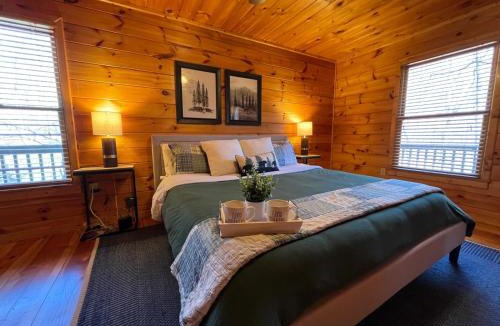 Hidden Lake House | Discover tranquility at Hidden Oasis, a charming home nestled in serene Cherry Log Mountain