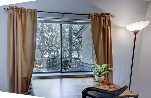 Folly Field Condo | Dog Friendly Condo with Fast WiFi, a Patio, & Shared Pool Walk to the Beach