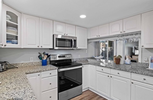 Folly Field Villa | Enjoy a walk to the beach from this renovated, pet friendly end-unit villa.