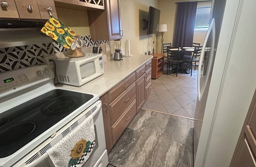 Taku - Campbell Apartment | Forget Me Not Home near Airport downstairs
