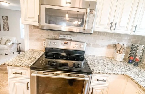 Arlington Park House | Heated pool home 5 min to downtown sleeps up to 8. Pet friendly!