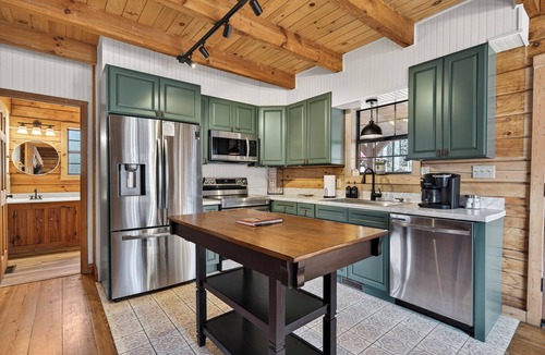 Milledgeville Cabin | Lakefront Escape w/Private Water Access, Dock, Kayaks, & Fire Pit. Pet Friendly!