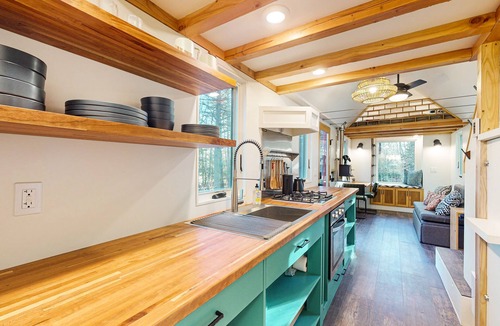 Gardiner Apartment | Lovingly crafted tiny home with wood stove, grill, & serene views
