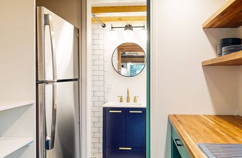 Gardiner Apartment | Lovingly crafted tiny home with wood stove, grill, & serene views