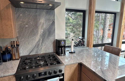 Alyeska House | Luxurious Orca Mountain Chalet - Nestled in Towering Trees with a Private Creek!