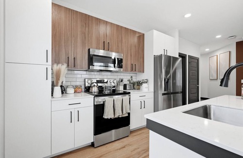 East Side Apartment | Luxury 2BR Near ATL Airport Food Hall Pool