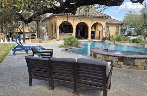 Bulverde House | Luxury Hill Country Villa with Private Pool, Grotto + Hot Tub