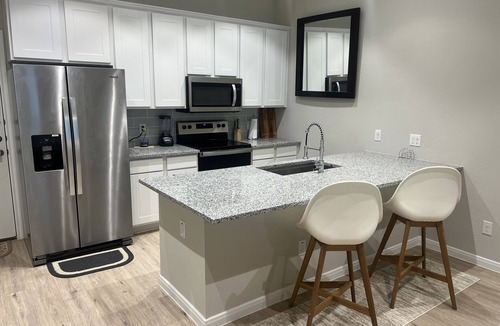 Barker House | New cozy Katy home! 3 Bed-2.5 bath, Hot tub, Karaoke Mic, relaxing fireplace.