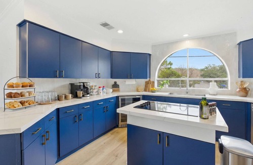 Medical Center District House | Outdoor Oasis Poolside Movie Nights Sleeps 16