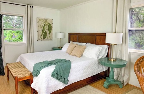 Rehoboth Beach Hotel | Palm Tree Room — Elegant British Colonial Luxury with Spacious Comfort