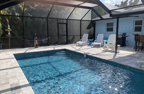 South Venice House | Palms and Pineapples- Tranquil Pool Home near Manasota Key and S Venice Beaches