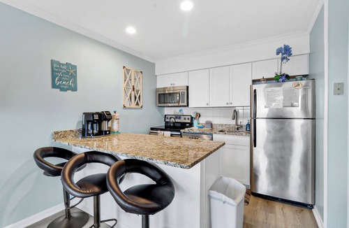 Hilton Head Island Condo | Panoramic paradise ocean beach front/steps to beach/heated pool condo!