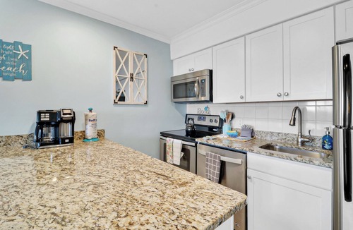 Hilton Head Island Condo | Panoramic paradise ocean beach front/steps to beach/heated pool condo!