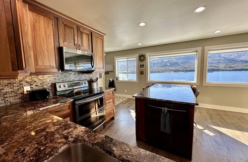 Ketchikan Apartment | Picture Perfect on the Water with large deck for spotting whales, eagles & more!