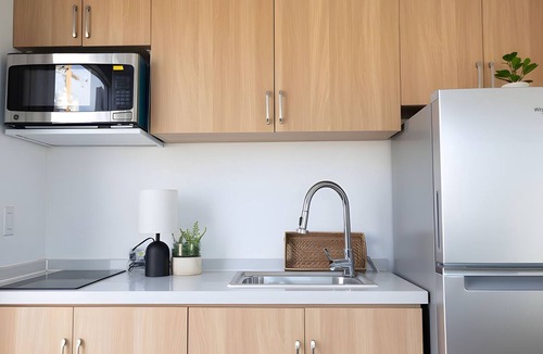 Pecos Apartment | Private Duplex Studio Suite with Queen Bed, Kitchenette and Private Bathroom.