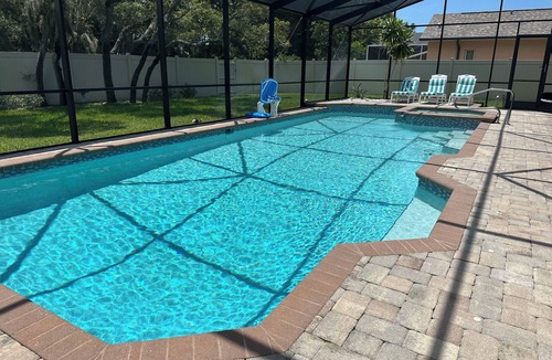 Palma Sola House | Private Pool 4 bd 3 ba with 2 King Master Suites Sleep 10 near AMI and IMG