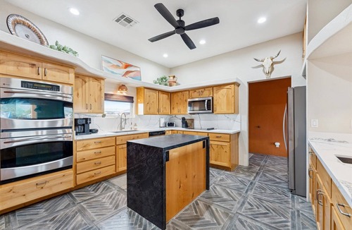 Apache Junction House | Resort-Style Backyard, Heated Pool, Waterslide, Games & Mountain Views!