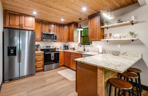 Canton Cabin | Riverfront Cabin, Sauna, Game Room, Fire-pit, Fishing, Pet Friendly, Sleeps 8