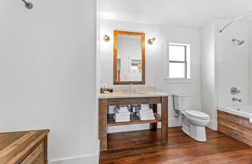 Comfort Cabin | Room with One King Bed and Shared Patio