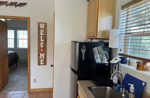 Rutheron Cabin | Rustic, Cozy Cabin Near Heron Lake with 5 Acres of Nature, Fire Pit & Views