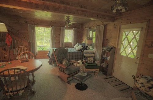 Finlayson Cabin | Rustic Two Level Tree Lodge Surrounded By The Forest With Fireplace And Fire Pit