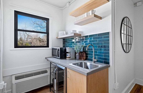 Charlotte Street Condo | Sabel #201 | Downtown Asheville king suite with parking, Wi-Fi, and smart TV.