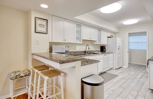 Litchfield by the Sea House | Short Easy Flat Walk to Beach - Pelican Watch 8a - Lakefront Villa w/Pool