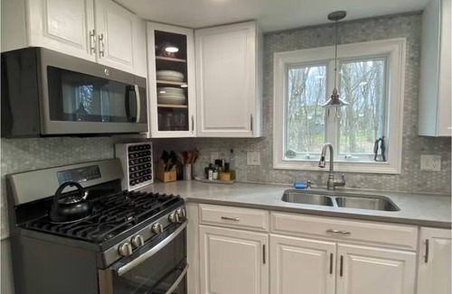 Longmeadow House | Spacious 4-bedroom house in Longmeadow with hot tub and central air.