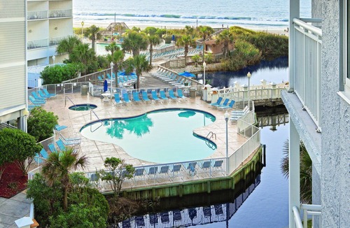 Arcadian Shores Resort | Spacious Oceanfront Resort with Onsite Restaurant, 5 Pools, 2 indoor Pools and Beach Access