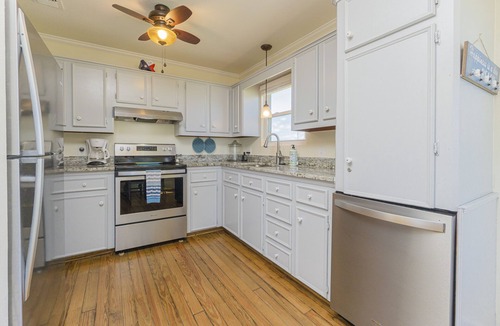 Bermuda Beach Cottage | Steps from Beach! Pet friendly home with an abundance of beach and ocean views