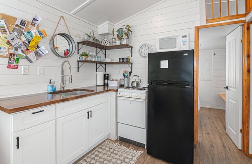 Spring Branch House | Summer Escape with Swim Hole and Golf Cart Rental