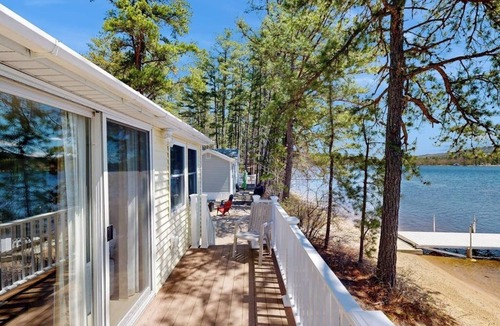 The Bays Cottage | Tranquil lakefront cottage with private beach, boat slip & fishing kayak access
