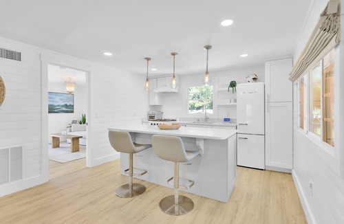 Folly Field House | Updated 4th row beach home, private pool, fenced in yard, and putting green!