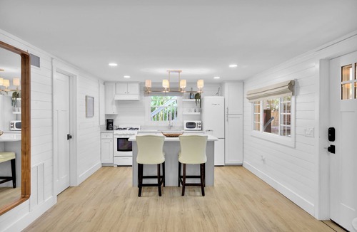 Folly Field House | Updated 4th row beach home, private pool, fenced in yard, and putting green!