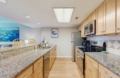 Ocean Ridge Condo | Waterfront townhome with pool, gym and tennis access, W/D, & central AC